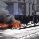 Emmanuel Macron argues free speech has limits as France protests rage