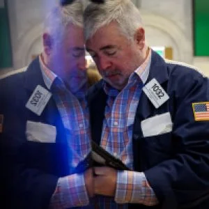 Stocks end November mixed despite a strong Thanksgiving week rally